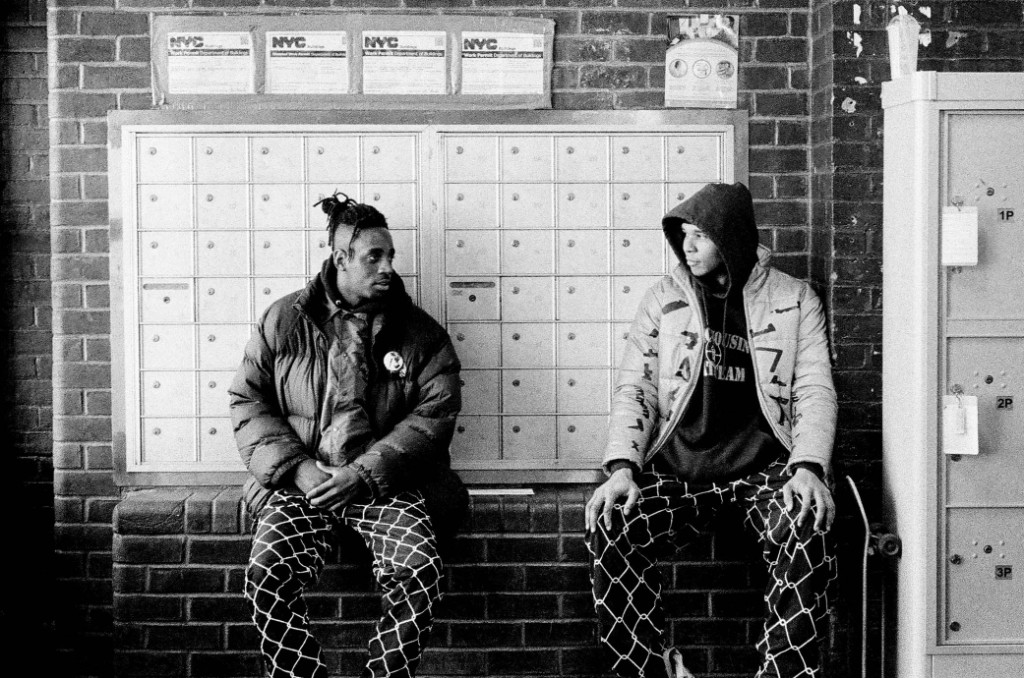 Public Housing Skate Team members in a housing building lobby